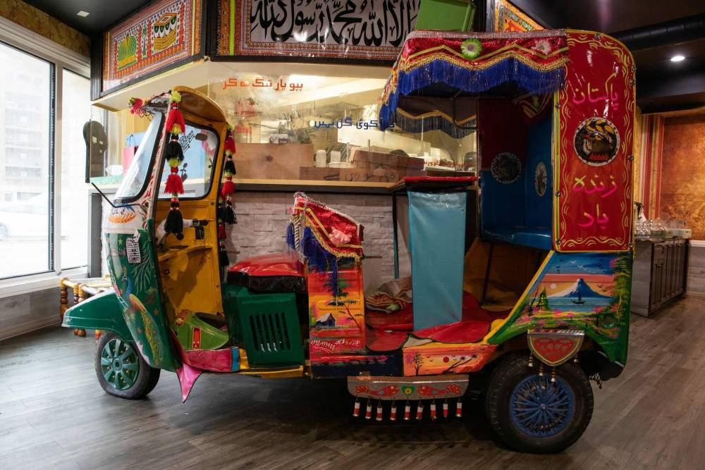 Owner Jehangir Khan says the restaurant’s three rickshaws are very popular with customers, especially the younger diners. (Jessica Lee / Winnipeg Free Press)