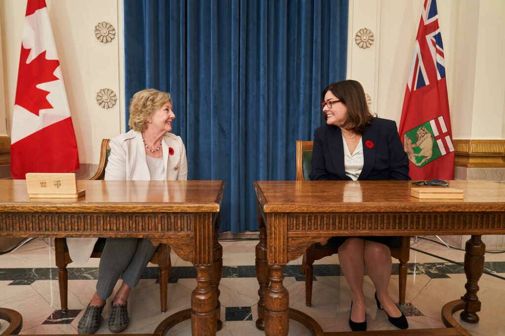 Lt. Gov. Janice Filmon (left) and Premier Heather Stefanson announced Thursday the medal will celebrate the contributions and achievements of 1,000 Manitobans, starting June 2022. (David Lipnowski / The Canadian Press files)