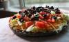 RUTH BONNEVILLE / WINNIPEG FREE PRESS ENT 
Auntie Mike’s Famous Taco Dip is one of Michelle Trudeau’s submissions to the family cookbook, entitled Relatively Famous Recipes.
