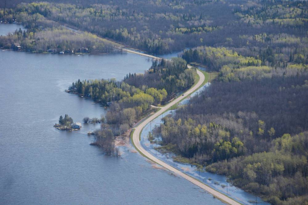 JOHN WOODS / THE CANADIAN PRESS
High water levels are washing out Provincial Road 307 and leading to several hundred residents being evacuated northeast of Winnipeg. The highway has been ranked Manitoba’s worst road.