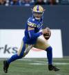 John Woods / THE CANADIAN PRESS
Blue Bombers quarterback Dru Brown scrambles against the Edmonton Elks during first half pre-season CFL action in Winnipeg, Friday.