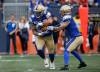 John Woods / THE CANADIAN PRESS
Bombers quarterback Dru Brown hands off to Brady Oliveira during the first-half action Friday against the Edmonton Elks.