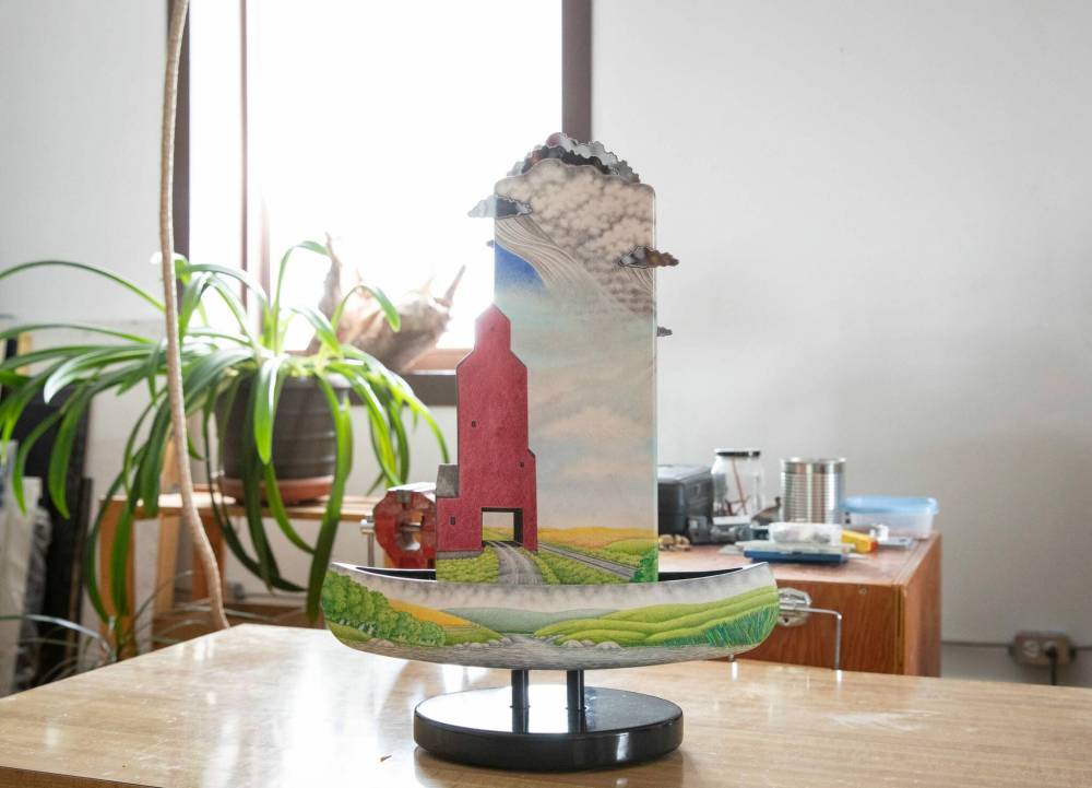 JESSICA LEE / WINNIPEG FREE PRESS
Prairie iconogrophy, such as a grain elevator, often features in Don Proch’s work.