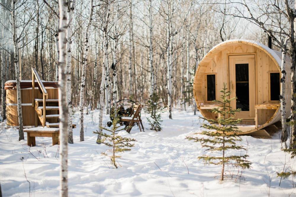 The common area at Boreal Plains includes a luxurious sauna and two cedar hot tubs — all powered by firewood. (Alyssa Dueck)