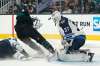 Tony Avelar / The Associated Press files
Winnipeg Jets goaltender Connor Hellebuyck will face Sharks left-winger Evander Kane (centre) tonight in San Jose.