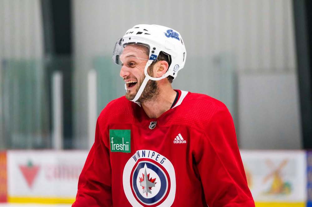 Daniel Crump / Winnipeg Free Press
Anthony Bitetto is all smiles during a recent Winnipeg Jets practice.