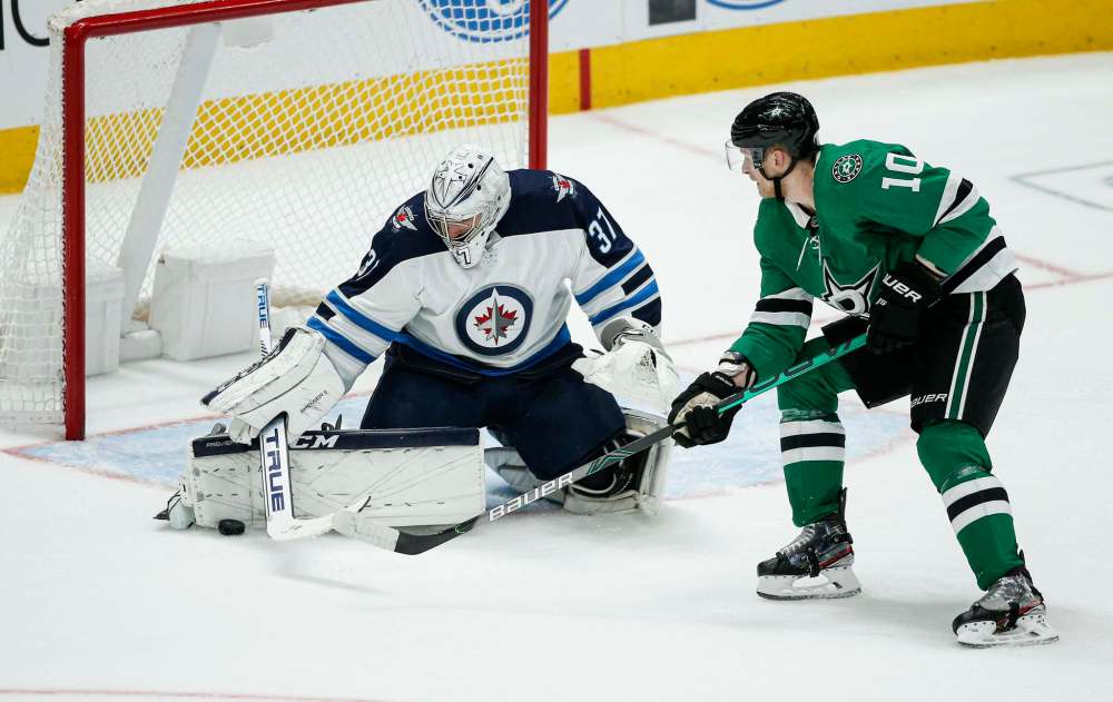 The penalty kill in the second period, led by Connor Hellebuyck, gave the Jets a major shot in the arm. (Brandon Wade / The Associated Press)
