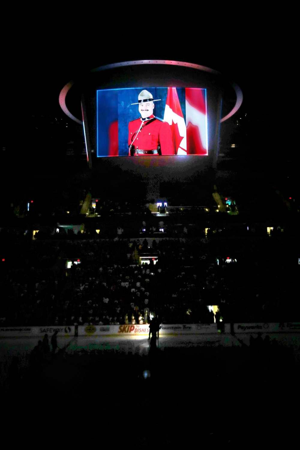 JOHN WOODS / WINNIPEG FREE PRESS
Const. Allan Poapst, who was killed in a collision while on duty, is honoured at the Winnipeg Jets game Sunday at Bell MTS Place.