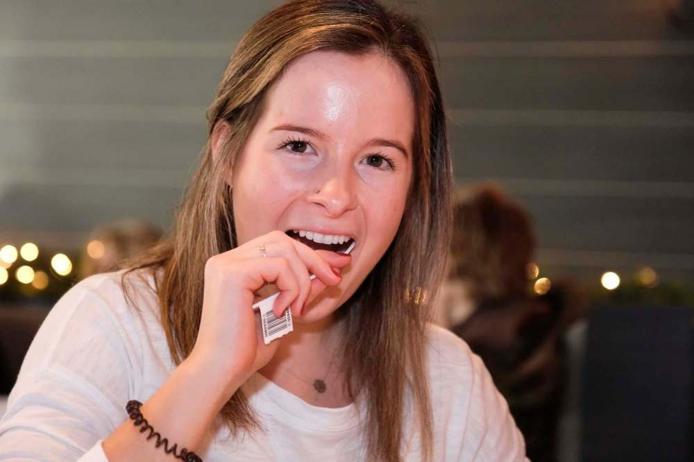 Alia Cappeliani, a friend of the Cianflone family, takes a swab test to determine her stem cell type. (Daniel Crump / Winnipeg Free Press)