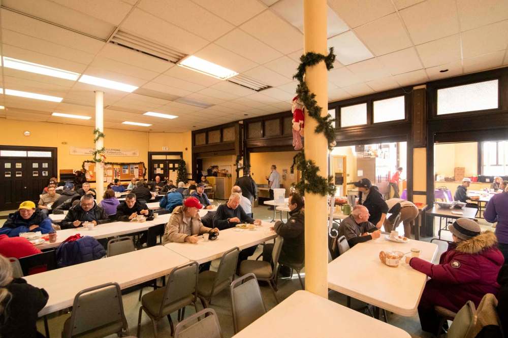 Guests find security and comfort within the walls of the Augustine Church in Osborne Village.