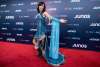 Kelly Fraser arrives on the red carpet at the Juno Awards in Vancouver on March, 25, 2018. The singer-songwriter has died at the age of 26. (Darryl Dyck / The Canadian Press files)