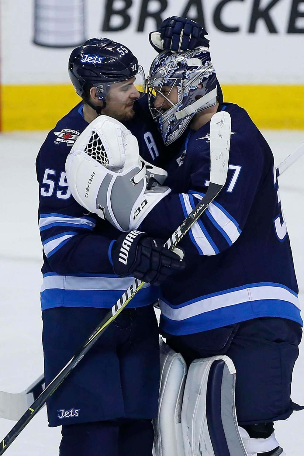John Woods / The Canadian Press files
Jets Mark Scheifele (left) and Connor Hellebuyck will play alongside the NHL’s best at the all-star game on Jan. 25 in St. Louis.