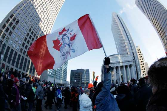 Idle No More protestors close down Winnipeg’s major intersection of Portage Avenue and Main Street in 2012. (John Woods / Free Press files)