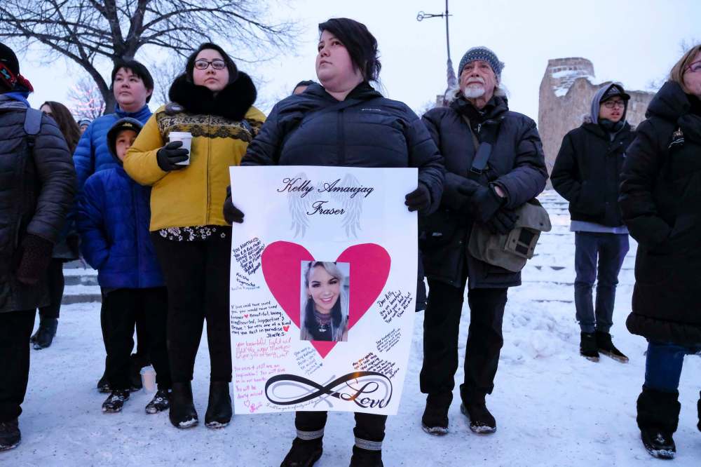 DANIEL CRUMP / WINNIPEG FREE PRESS
An attendee holds a sign commemorating Kelly Fraser during a vigil in the singer's honour at the Odena Circle.
