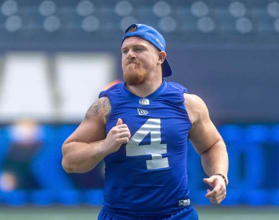 SASHA SEFTER / WINNIPEG FREE PRESS Winnipeg Blue Bombers linebacker Adam Bighill (4) runs through drills during a practice at IG Field on Wednesday afternoon. 190814 - Wednesday, August 14, 2019.