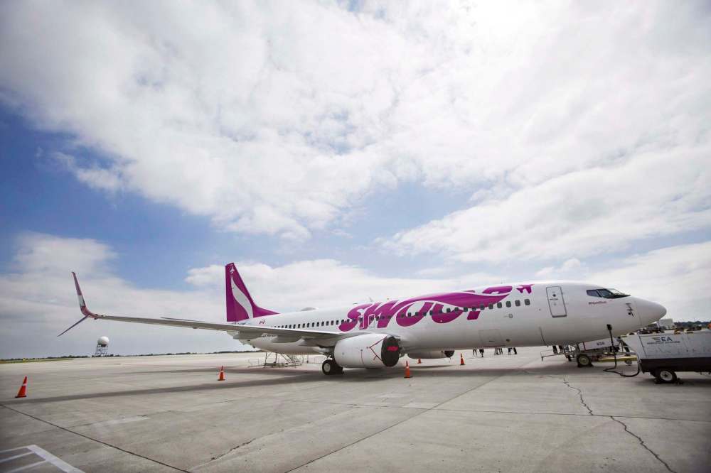 Swoop is putting up 100,000 seats as part of its promotion. (Tara Walton / Canadian Press files)