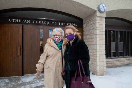 Lorraine Schmidt and her daughter Susan Pearce after enjoying a service at the Evangelical Lutheran Church of the Cross (Mike Sudoma / Winnipeg Free Press)