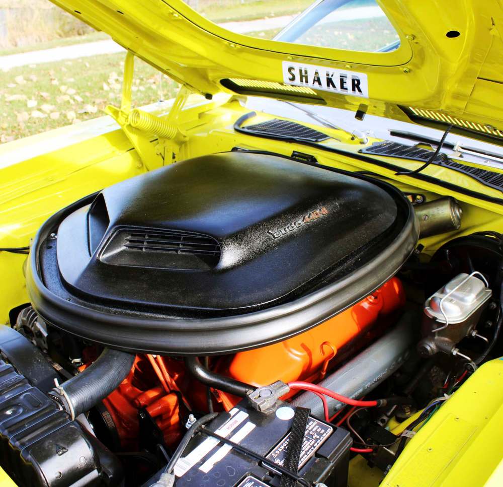The 440 cubic-inch V-8 engine, equipped with a six-barrel carburetor and Shaker hood option, makes 385 horsepower.