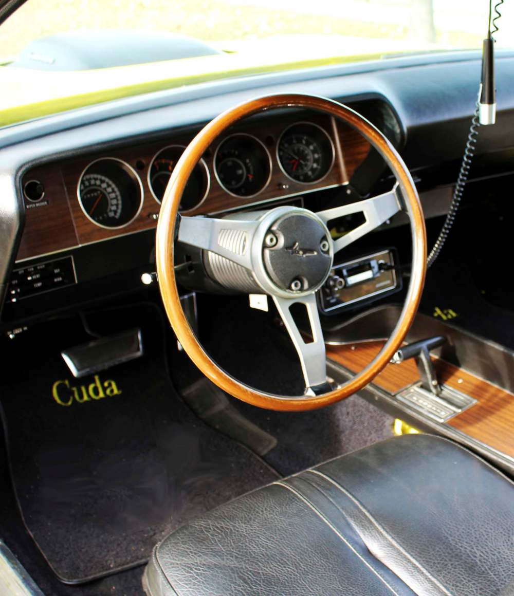 Interior highlights include black vinyl bucket seats and a cassette player and recorder option.