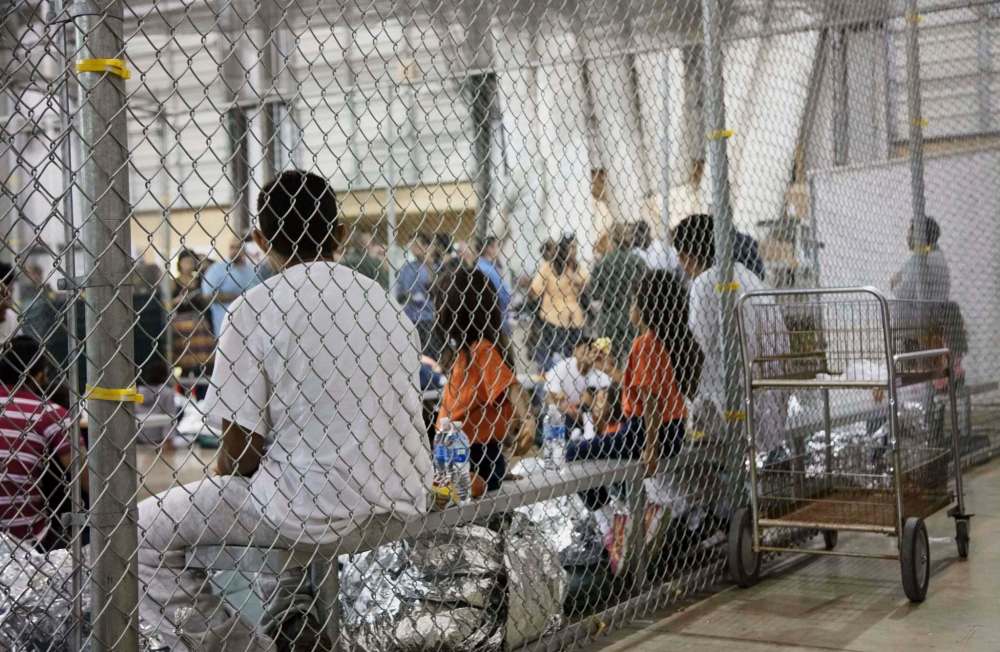 U.S. Customs and Border Protection / The Associated Press files
Children are housed in a wire cage at a facility in McAllen, Texas, in June 2018.