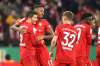 Matthias Schrader / The Associated Press
Bayern's Robert Lewandowski, left, celebrates after scoring his side's third goal during the German soccer cup, DFB Pokal, match between FC Bayern Munich and TSG Hoffenheim.