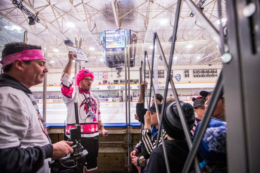 Winnipeg Ice game host A.J. Leite pumps fans up before the game.