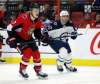 THE CANADIAN PRESS/Fred Chartrand
Winnipeg Jets defenceman Dylan DeMelo, right, plays against former Ottawa Senators teammate Brady Tkachuk in Ottawa on Thursday.