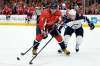 (AP Photo/Nick Wass)
Washington Capitals left wing Alex Ovechkin and Winnipeg Jets defenceman Dmitry Kulikov reach for the puck during the second period Tuesday in Washington.