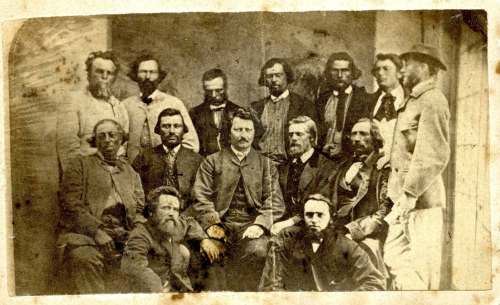 This photo, circa 1869, shows Louis Riel (centre) and his provisional government. Author M. Max Hamon argues Riel ‘was chosen to lead not because of his military reputation but for his ideas and ability to persuade.&rsquo; (University of Manitoba archives)