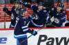 Dmitry Kulikov (7), Anthony Bitetto (2) and Nathan Beaulieu (88) celebrate Kulikov's goal during the first period. (John Woods / The Canadian Press)