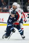 Mason Appleton collides with Ilya Kovalchuk during the second period. (John Woods / Winnipeg Free Press)