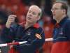 michael burns jr. photo
Lead Don Bartlett, right, and team Alberta skip Kevin Martin talk strategy during the Continental Cup in 2002. Bartlett is coaching the legendary Edmonton skip&rsquo;s son Karrick Martin and his Team Alberta at the Brier this week.