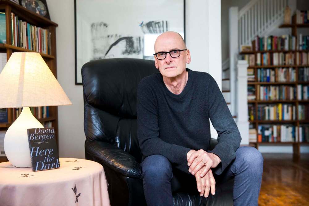 MIKAELA MACKENZIE / WINNIPEG FREE PRESS
Author David Bergen in his Winnipeg home with his new collection of short fiction, Here the Dark.