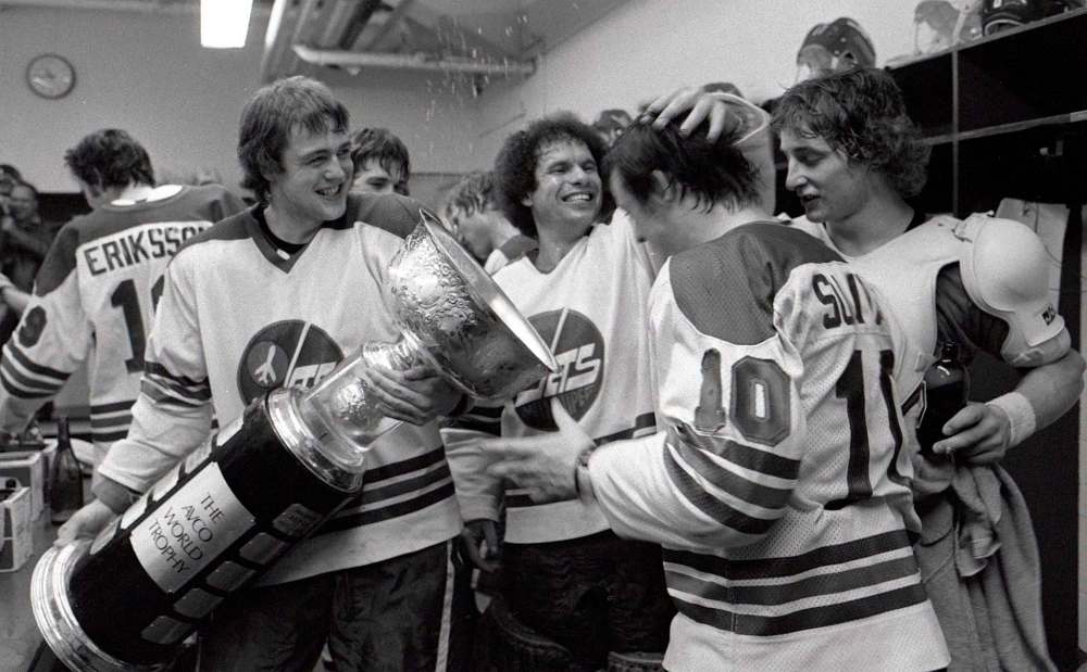 JON THORDARSON / WINNIPEG FREE PRESS FILES
Kent Nilsson (left), Joe Daley and Peter Sullivan celebrate the Jets 1979 Avco Cup victory.
