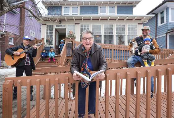 RUTH BONNEVILLE / WINNIPEG FREE PRESS70-year-old Wolseley resident, Tabitha Langel, centre, with her neighbours, Steven Howes, left, and Tessa Nussbaum (with her children and puppy) is calling on Winnipeggers to limber up their voices and join in to help us all get through this crisis at a singalong planned this coming Saturday.