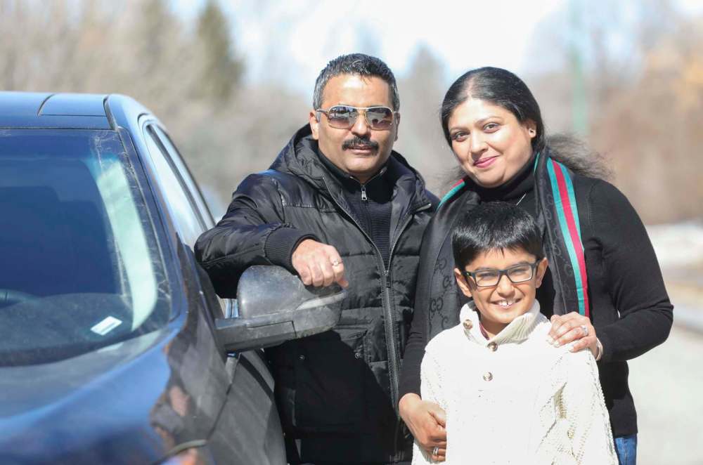 RUTH BONNEVILLE / WINNIPEG FREE PRESS
Rashmi Saxena (right), husband Ankur Aneja, and son Kabir, moved to Winnipeg in January. Saxena has established We Got This — Winnipeg, a Facebook group that helps connect people with assistance during the COVID-19 pandemic.