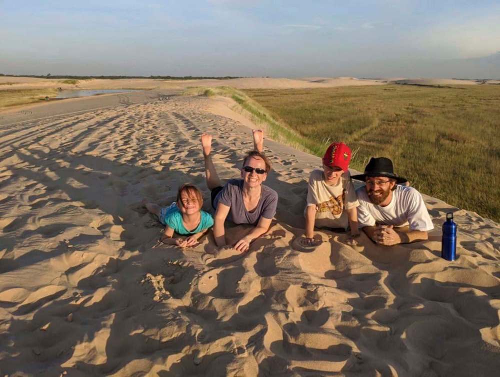 SUPPLIED
Rev. Joshua Paetkau, his wife Bethany and their children Rose and Solomon enjoy a sand dune near Santa Cruz, Bolivia.