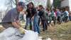 KEN GIGLIOTTI / WINNIPEG FREE PRESS FILES
Sandbagging, such as this 2009 effort on Scotia Street in Winnipeg, is work that requires close-quarters exertion by crews.
