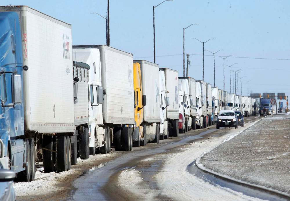 Weight restrictions are typically placed on heavy commercial vehicles in the spring to protect roads during the time when they are most likely to weaken due to weather changes, but the revised restrictions will let vehicles transport essential commodities at a normal weight. (Colin Corneau / Brandon Sun files)