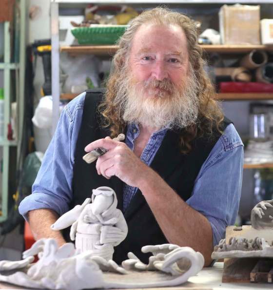 Van Sewell works in his South Point Douglas studio. One of his latest pieces is called Heavy Seas, inspired by the pandemic and by artist Hieronymus Bosch.