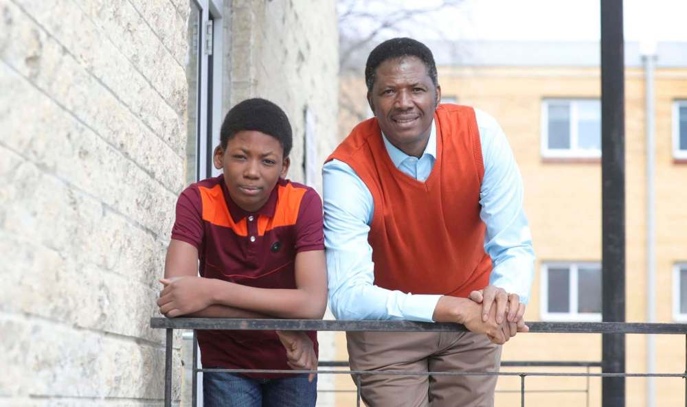Olufemi Oshinowo, with Damisi, arrived in Winnipeg in January. (Ruth Bonneville / Winnipeg Free Press)