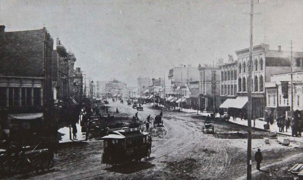 Archives of Manitoba
Main Street south from William, 1885. The completion of the railway line to Winnipeg from the south in December 1878 triggered rapid development, and the land boom was on.