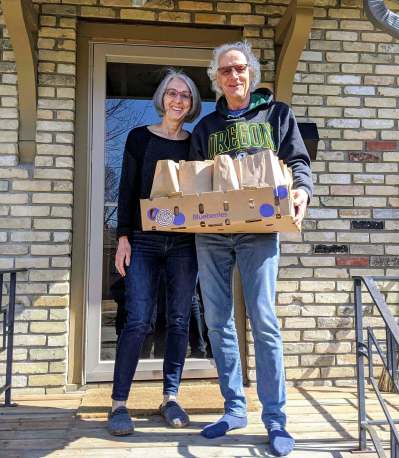 Esther and Reynold Redekopp with sandwiches for 1JustCity.