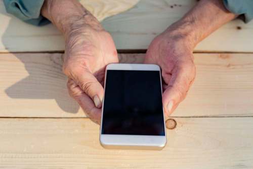 Connecting with people is as easy as picking up a phone and calling someone. (Polina Tomtosova / Dreamstime files)