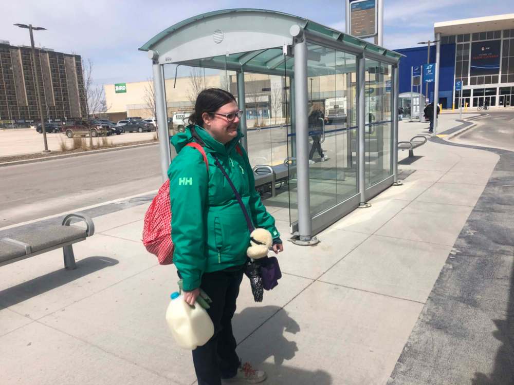 JOYANNE PURSAGA / WINNIPEG FREE PRESS
Candace Prior waits for a transit bus at Polo Park on Monday.