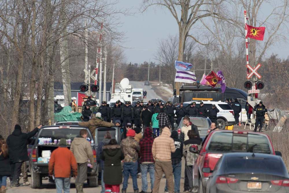 Rail blockades near Belleville, Ont., Feb. 24: A poll suggests more than half of Manitobans favour letting police use whatever force is necessary to end disruptive forms of protests. (Lars Hagberg / The Canadian Press files)