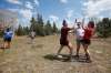 Sara Scholefield (from left), Jessica Popowich and Kelsey Weibe high-five each other as they celebrate after defeating their male friends Jonathan Bennett, Zach Wood and Domenic Horvath in a game of spike ball at Birds Hill park Sunday. John Woods / Winnipeg Free Press