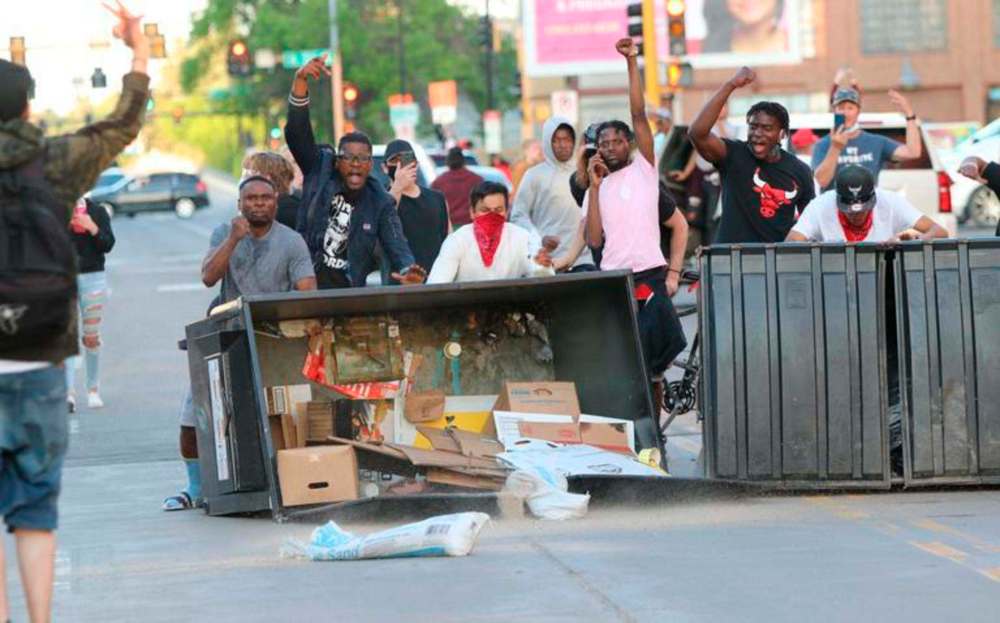 The protest march in Fargo Saturday, was peaceful, but a group of marchers became violent in the evening. C.S. Hagen / Fargo Forum