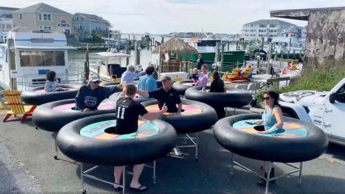 Katie Kirby / Associated Press
Fish Tales, a restaurant in Ocean City, Md., recently debuted its ‘bumper tables,&rsquo; which let customers move about and socialize while keeping them at a safe distance.