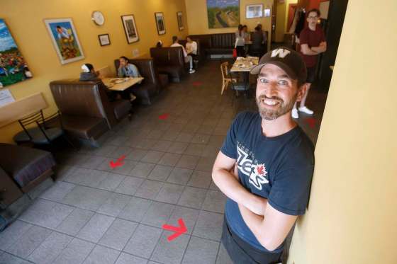 JOHN WOODS / WINNIPEG FREE PRESSJarrett Bargen, manager of the Falafel Place, says Phase 3 isn’t making a difference. Despite the loosened restrictions, the need for distancing between tables hasn’t changed how many can fit inside. (John Woods / Winnipeg Free Press)